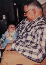 Albert holding his grandson Sean
