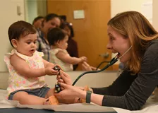 Dr. Laura Ardvinson-Guzman smiling at a patient.